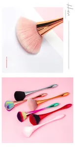 Detail of multi-functional rose flower nail dust brush with metallic handle and soft bristles