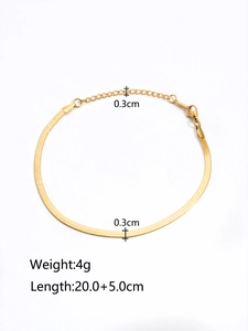 Detail of 0.3cm flat snake chain bracelet in 18K gold plated steel with lobster clasp