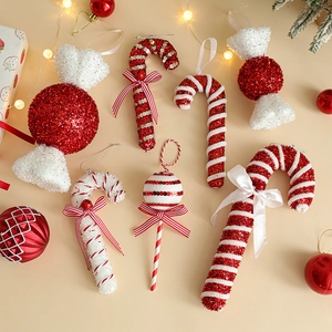 Festive red and white Christmas candy ornaments with glitter canes and lollipops decor