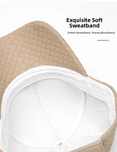 Detail view of beige PU leather baseball cap featuring quilted texture and soft cotton sweatband