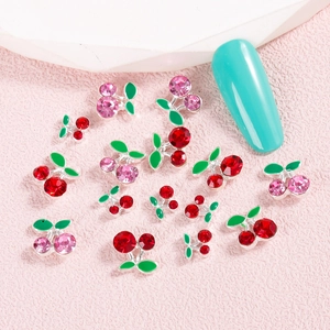 Sparkling cherry nail art charms with red and pink rhinestones on metal base