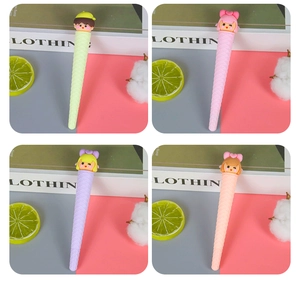 Detail of cute ice cream cone gel pens with cartoon character toppers in pastel colors