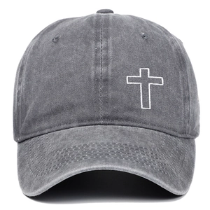 Detail of washed charcoal grey cotton baseball cap with white cross embroidery and stitching