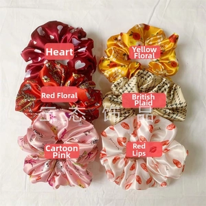 Detailed set of six assorted satin scrunchies featuring heart, floral and plaid patterns