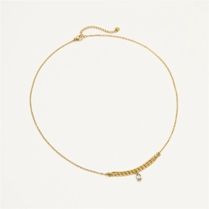 Detail of gold titanium necklace with zircon pendant and triple-layered bead chain link