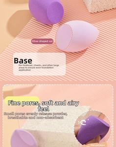 Close-up of soft purple makeup sponge with olive slanted edge for smooth base application