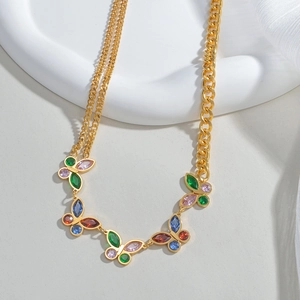 Collana a farfalla vintage francese in acciaio inossidabile dorato con zirconi colorati