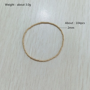Detailed view of 2mm gold stainless steel beaded bracelet with spec annotations