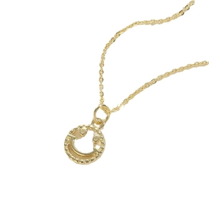 Minimalist gold thin chain necklace featuring a hollow smiley face pendant on white background