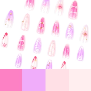 3D floral press-on nails with pink and purple gradient and metallic gold studs