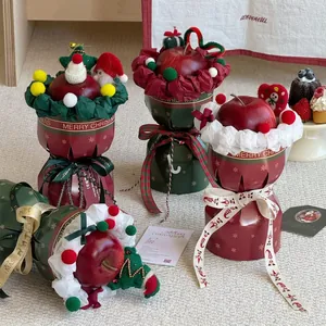 Christmas apple bouquet packaging set with festive ribbons and decorative mini dolls