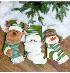 Detailed knitted Christmas stockings featuring Santa, Reindeer, and Snowman characters