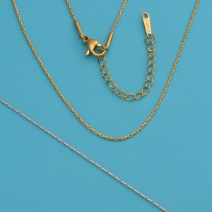 Detail of 18k gold and silver stainless steel chain necklaces with lobster clasps