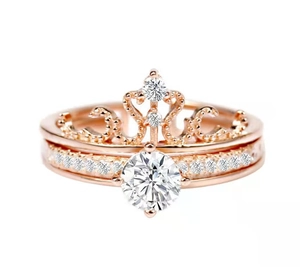 Rose gold crown projection ring set with brilliant cut diamonds in a stackable style