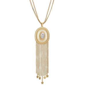 Bohemian gold stainless steel necklace with hollow oval pendant, pearl, and tassel details