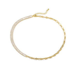 Detail of gold pig nose necklace featuring zircon pavé and adjustable O-chain design