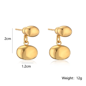 Detail view of gold geometric drop earrings with 2cm height and 12g weight measurement