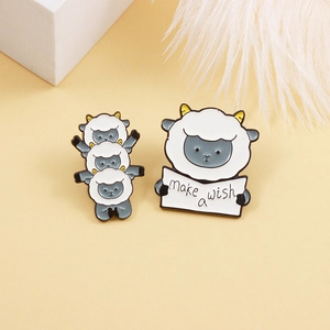 Cartoon lamb enamel pins including stacking sheep and make a wish sign for clothing