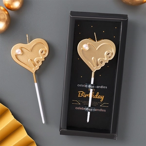 Candela Love dorata a forma di cuore con perla e confezione regalo nera inclusa