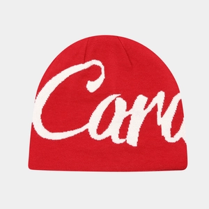 Detailed knit texture and white Cana jacquard lettering on red street style beanie