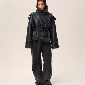 Women's black faux fur leather jacket with waist belt and British style lapel collar