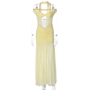 Detail view of the yellow mesh patchwork dress featuring waist ruching and cutout style