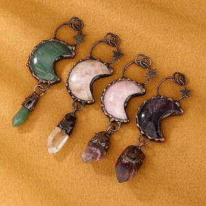 Vintage bronze moon and star crystal pendants with assorted natural quartz stones