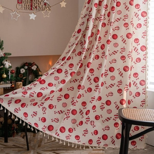 Beige Christmas window curtain with red candy ornaments and festive fringe decoration