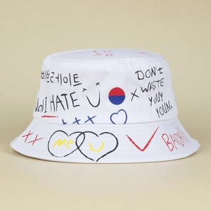 Streetwear white canvas bucket hat with graffiti letters and colorful heart patterns