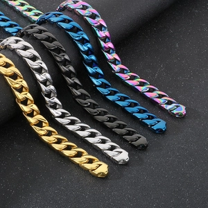 Detailed view of 15mm heavy Cuban link chains in gold, silver, black, blue, and rainbow