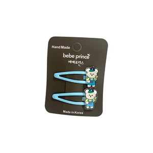 Set of two light blue candy-colored cartoon bear hair clips for children on display card