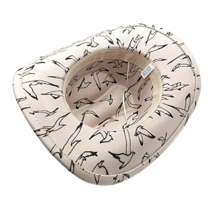 Detail of western fedora hat interior with sweatband, wind rope and seagull pattern