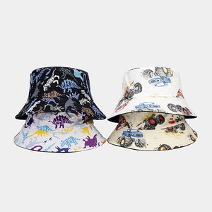 Cartoon reversible bucket hats for kids with dinosaur and monster truck patterns
