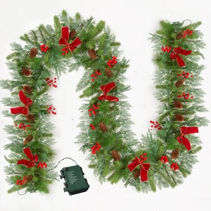 Detail of 9FT Christmas garland featuring red bows, pine cones, berries and battery box
