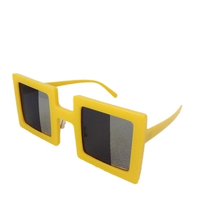 Bright yellow square frame sunglasses with dark lenses for a retro fashion street look