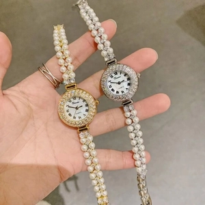 Elegant gold and silver quartz watches for women with pearl strap and crystal accents