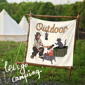 Détail de la bannière de camping en toile avec illustrations rétro et œillets en métal