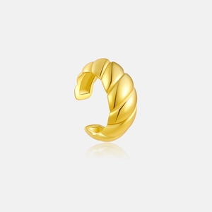 Detailed close-up of golden S925 silver croissant ear cuff with twisted spiral texture