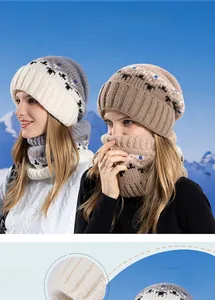 Detail of winter knitted beanie and neck warmer set with snowflake jacquard pattern