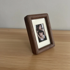 Minimalist black walnut solid wood picture frame with elegant 45-degree tabletop display