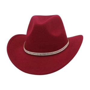 Detail of burgundy wool felt cowboy hat with sparkling rhinestone band on white background