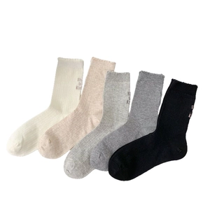 Five-pack set of ribbed crew socks with She is Kind embroidery in assorted neutral colors