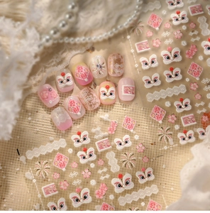Detail of 3D embossed pink lion dance nail stickers with lace and cherry blossoms
