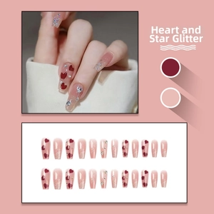 Detail of 24pcs pink coffin press-on nails with red heart patterns and silver glitter