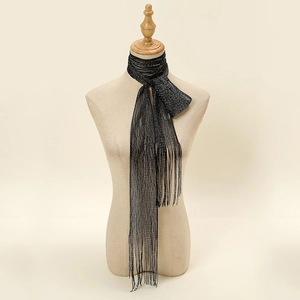 Elegant black mesh scarf with silver metallic thread and fringes on a mannequin