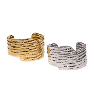 Classic 18k gold and silver hammered stainless steel open bracelets set on white background