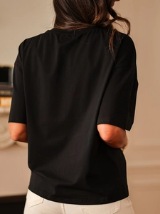 Slim fit black short sleeve T-shirt with back view of embroidery and pleated details