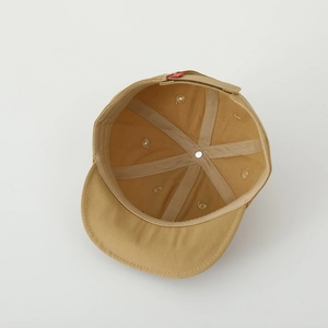 Detailed interior view of a cotton toddler baseball cap with reinforced stitching and seams