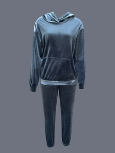 Detailed view of velvet texture on dark grey hoodie and jogger loungewear set