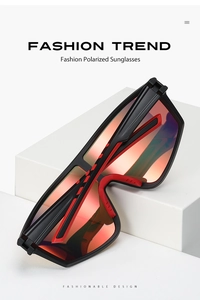 Detail of polarized sports sunglasses with black frame and orange gradient mirror lenses